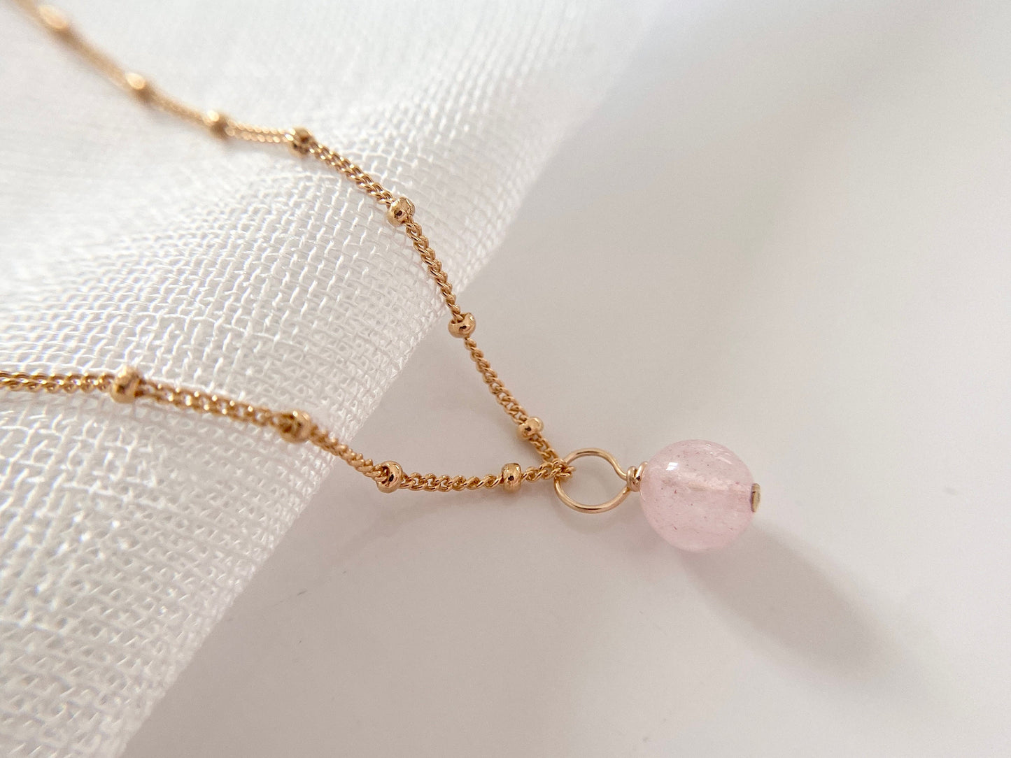 Rose quartz gold pendant necklace
