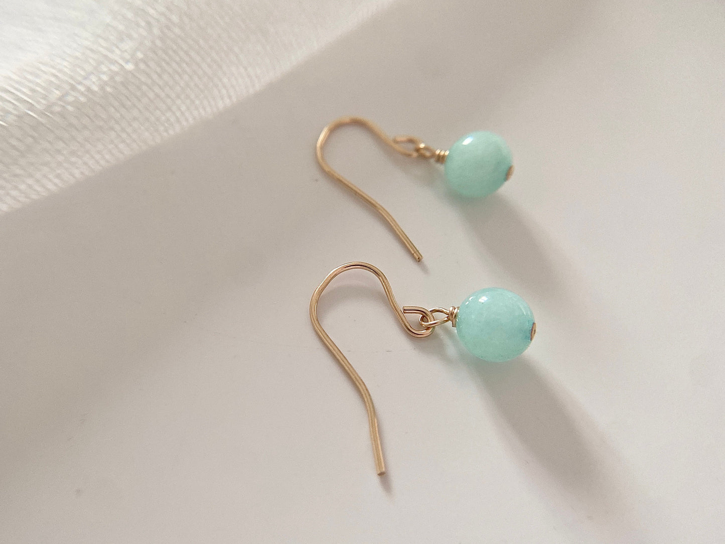 Gold jade drop earrings