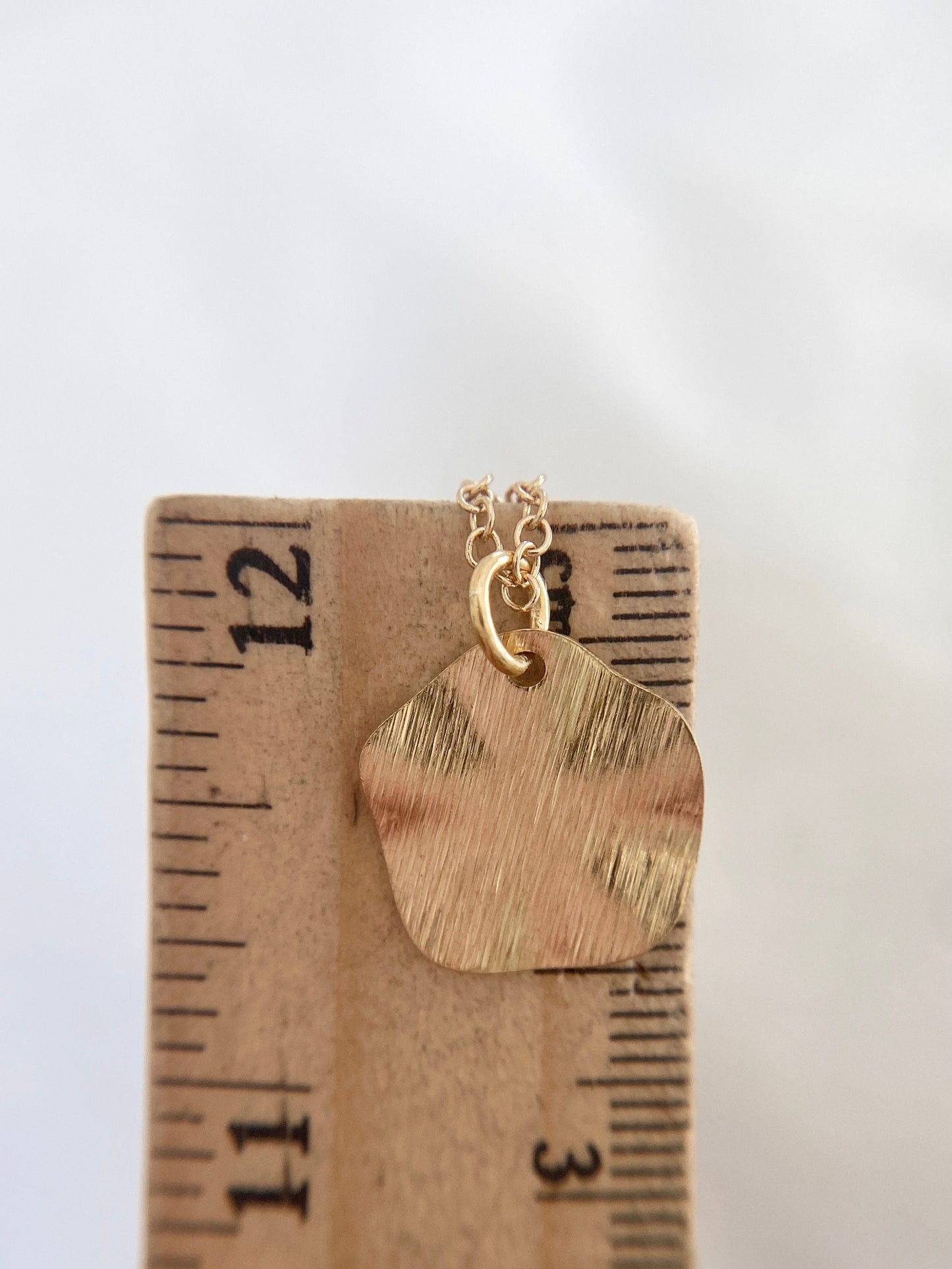 Gold Plated Wavy Disc Pendant Necklace